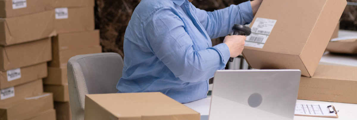 woman scanning package for delivery